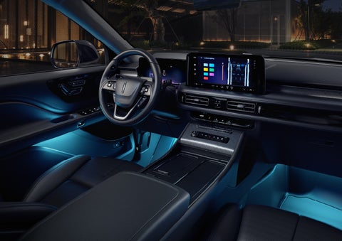 Deep blue Ambient Lighting glows from various places within a 2026 Lincoln Aviator® SUV. | Green Lincoln in Greensboro NC