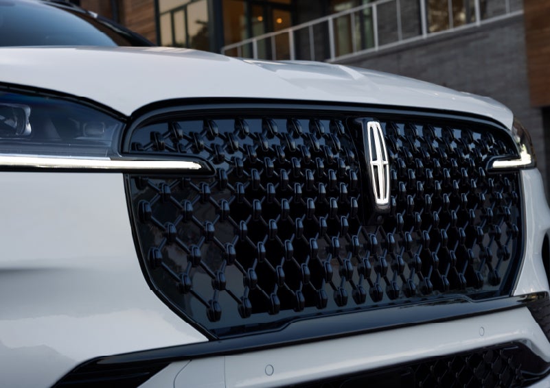 The front grille of a 2026 Lincoln Aviator® SUV is shown. | Green Lincoln in Greensboro NC