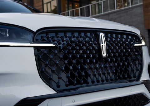 The front grille of a 2026 Lincoln Aviator® SUV is shown. | Green Lincoln in Greensboro NC
