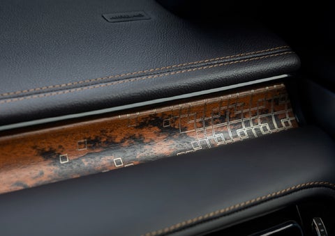 A close-up shot of the 2026 Lincoln Aviator® dashboard with unique black and brown accents and brown stitching | Green Lincoln in Greensboro NC
