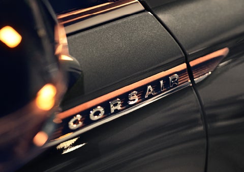 The stylish chrome badge reading “CORSAIR” is shown on the exterior of the vehicle. | Green Lincoln in Greensboro NC