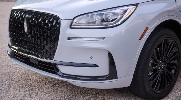 The all-black grille of the available Jet Appearance Package on a 2026 Lincoln Corsair® SUV is shown. | Green Lincoln in Greensboro NC