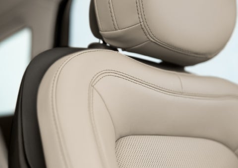 Fine craftsmanship is shown through a detailed image of front-seat stitching. | Green Lincoln in Greensboro NC