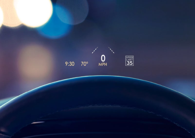 Useful driver information is being projected in front of the steering wheel on the windshield via the available head-up display. | Green Lincoln in Greensboro NC