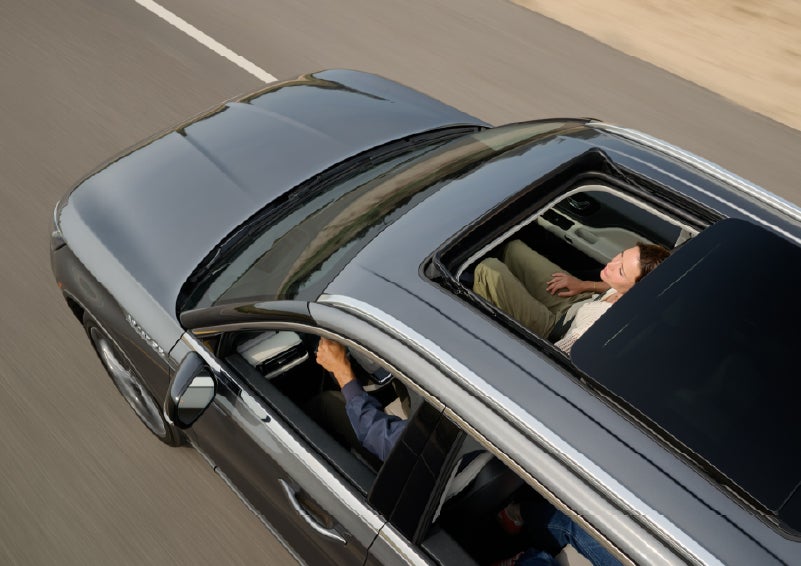 The available panoramic Vista Roof® of a 2027 Lincoln Aviator® SUV is open. | Green Lincoln in Greensboro NC