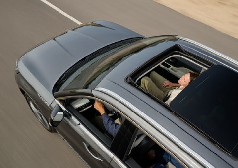 The available panoramic Vista Roof® of a 2027 Lincoln Aviator® SUV is open. | Green Lincoln in Greensboro NC