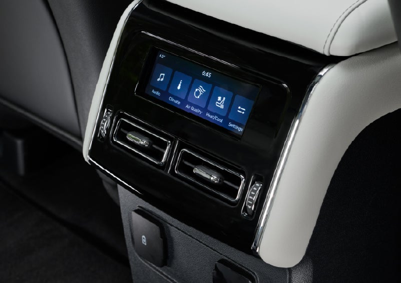 The second row touch screen displays audio and temperature control settings. | Green Lincoln in Greensboro NC